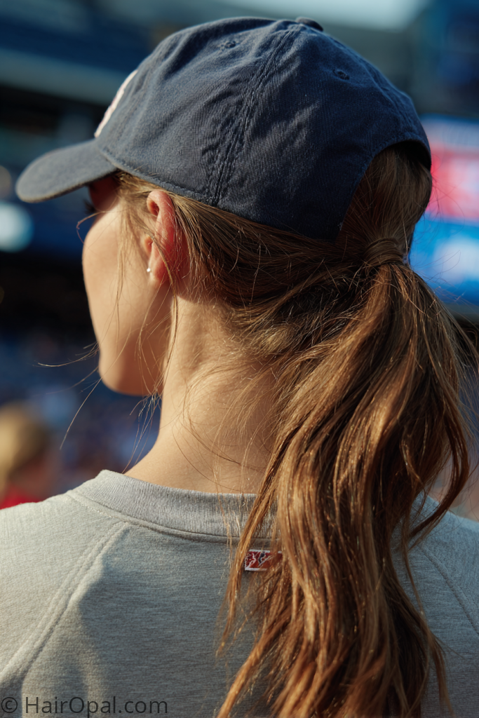 simple baseball game hairstyle medium hair cap ponytail