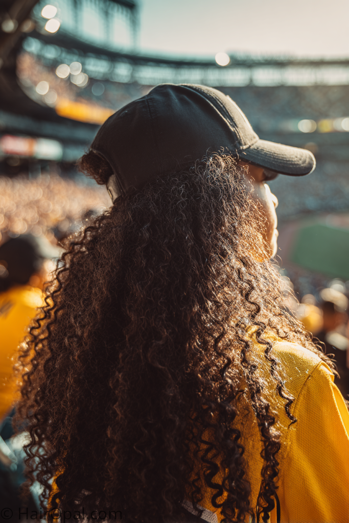 curly hair baseball game hairstyle cap natural curls game day