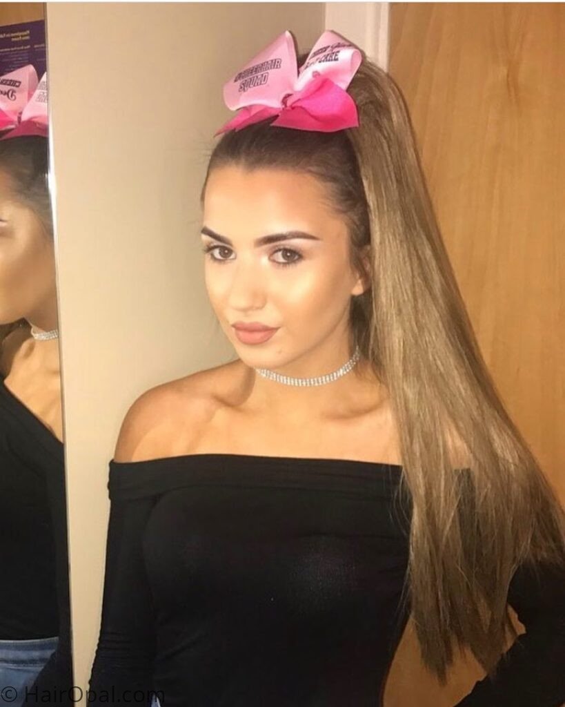 High ponytail with a bow for cheer camp