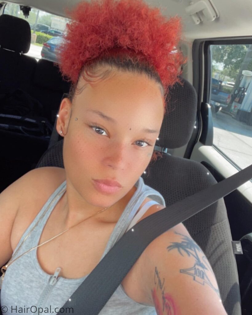 een with a high natural puff hairstyle for back to school