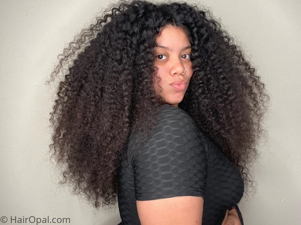 Teen with a defined twist out natural hairstyle for back to school