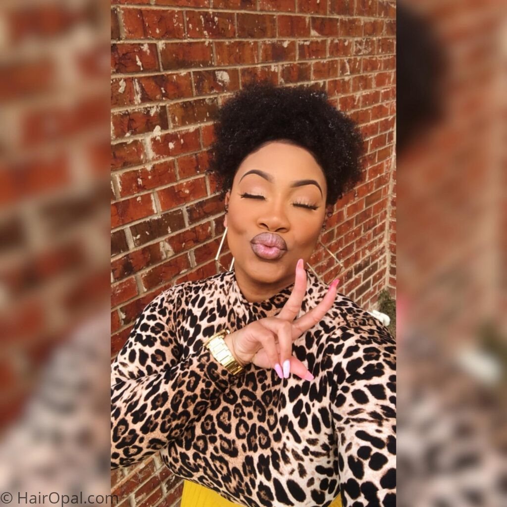 Black girl with a high natural puff hairstyle for back to school — no braids